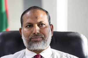 Home minister defends warning to stop protests