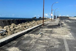 Caution urged after swell surges on highway